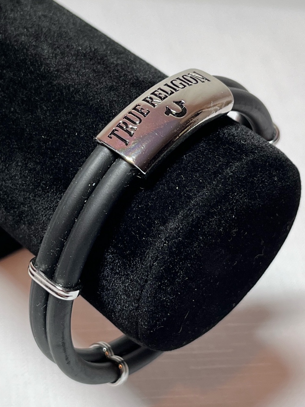 True Religion Black Rubber Bracelet with Silver Logo Plate